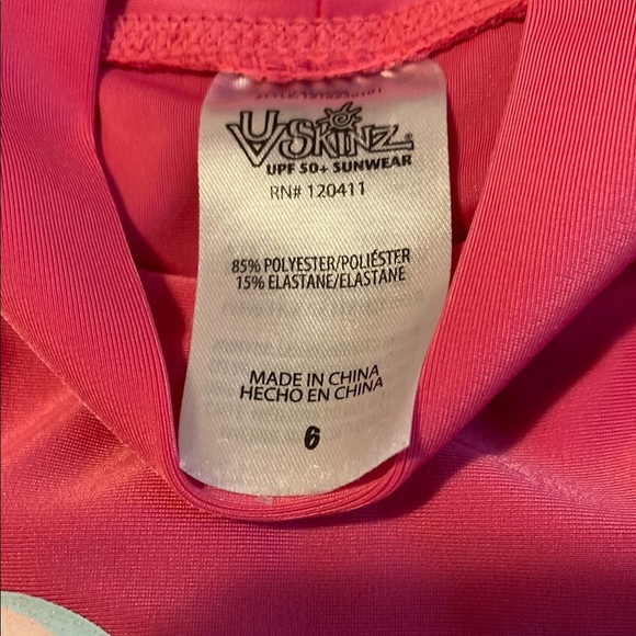 Vibrant Pink Rashguard with Floral Sleeves and High Collar - Picture 2 of 5